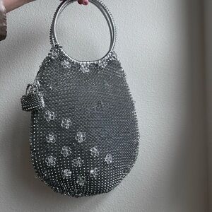 One of a kind silver plastic wired Bag